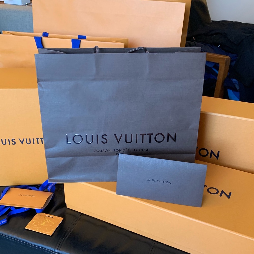 Louis Vuitton shopping bag.